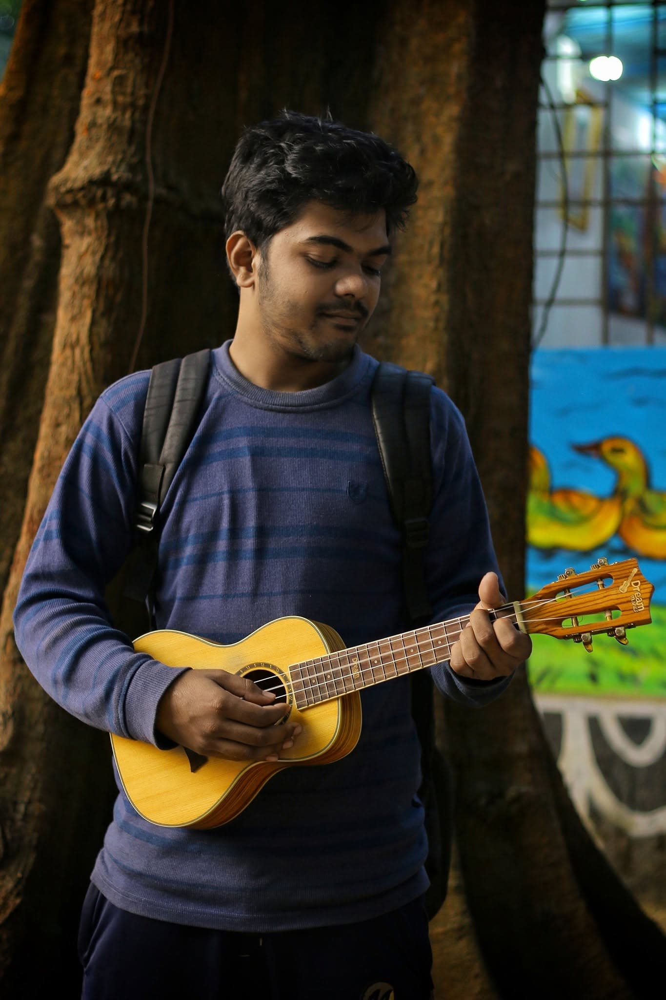Raihan with a ukulele